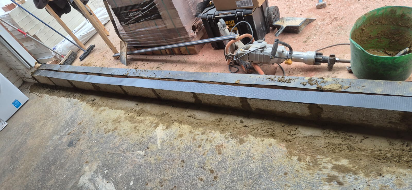 Garage conversion in progress — stud wall framing and first fix electrics, Chelmsford